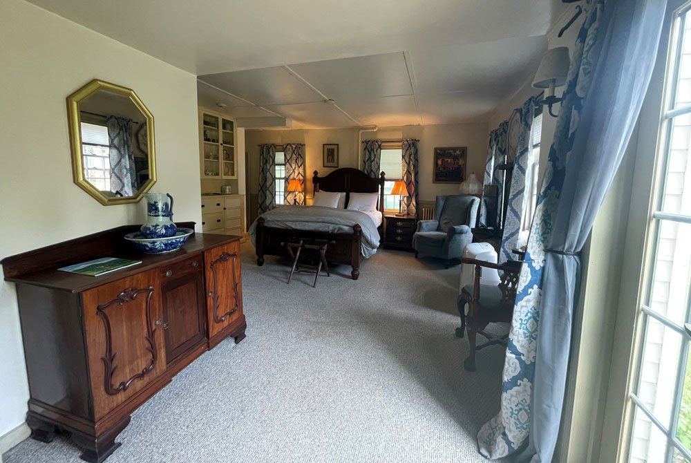 Sarah's Room: blue floral curtains and blue-and-white porcelain washstand